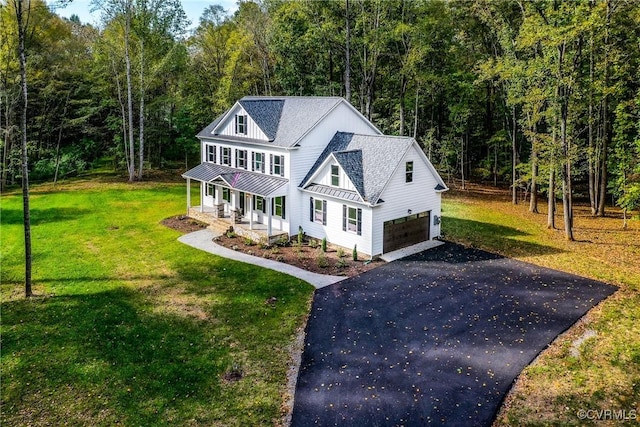 view of front of home with a porch and a front lawn