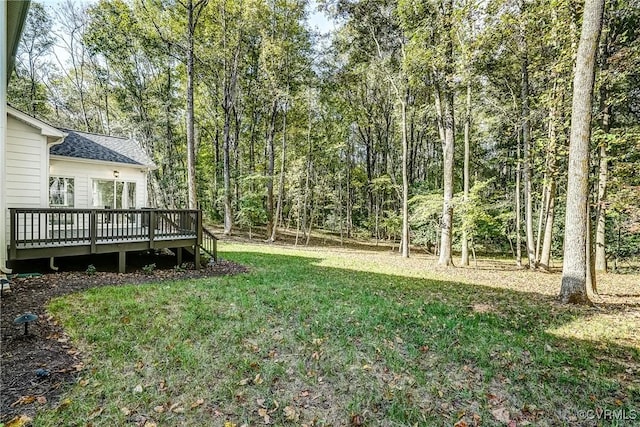 view of yard featuring a deck