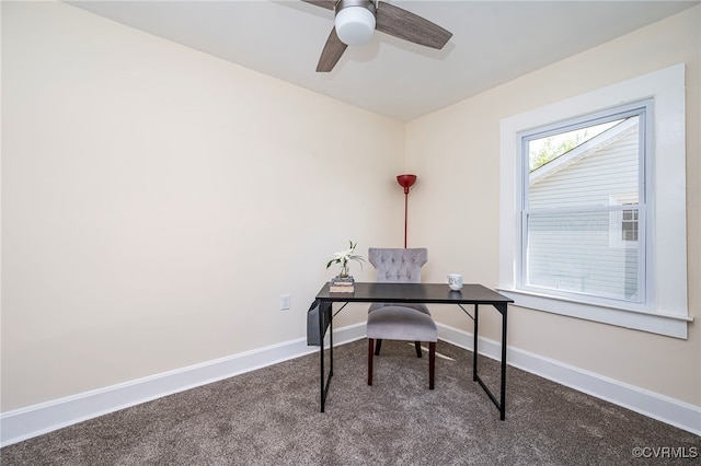 office space featuring ceiling fan and carpet