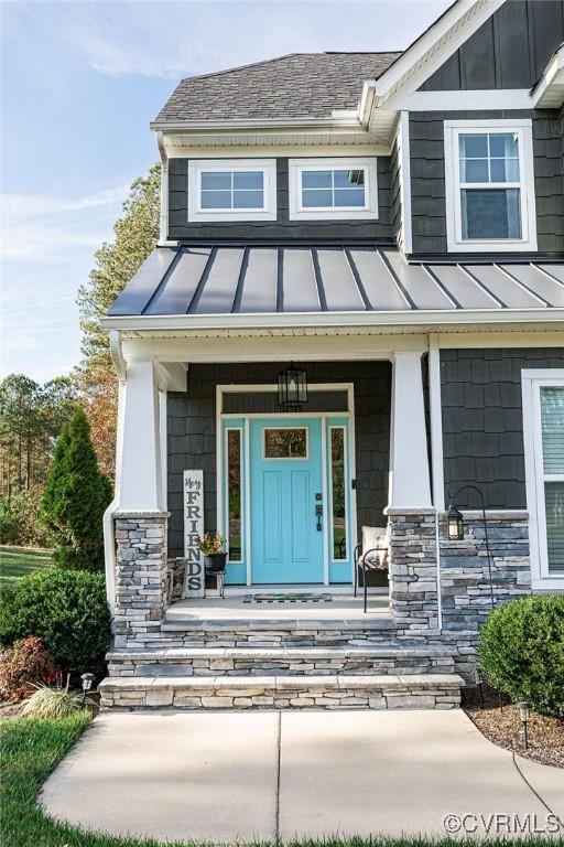 property entrance with a porch