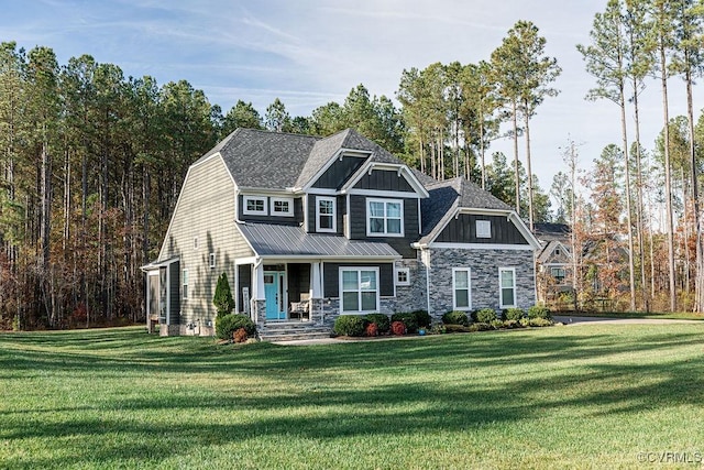 craftsman house with a porch and a front lawn