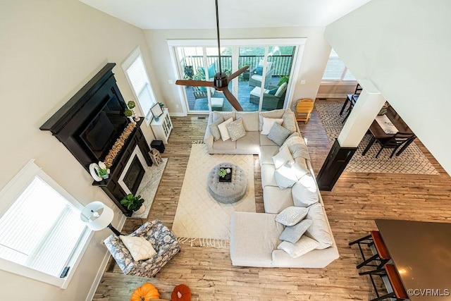 living room featuring plenty of natural light and light wood-type flooring