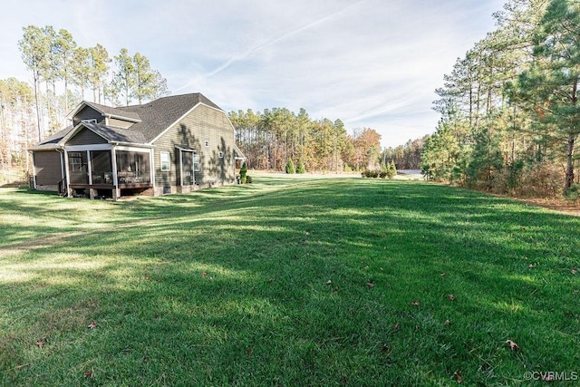 view of yard with a sunroom