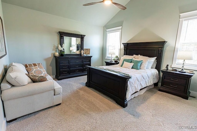 carpeted bedroom with lofted ceiling and ceiling fan