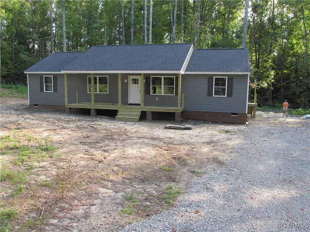 ranch-style home with covered porch