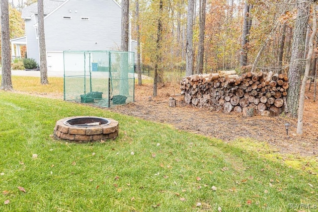 view of yard featuring a fire pit