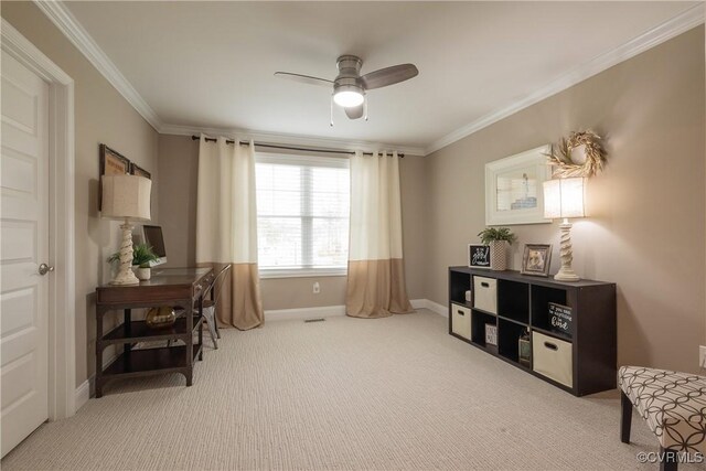 living area featuring ornamental molding, carpet, and ceiling fan