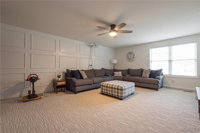 12618 Capernwray Ter, Chesterfield, VA 23838 - carpeted living room featuring a decorative wall and ceiling fan