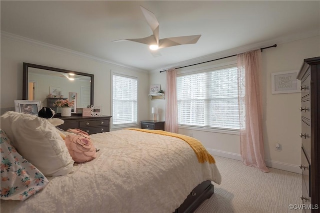 bedroom featuring light carpet, crown molding, and ceiling fan