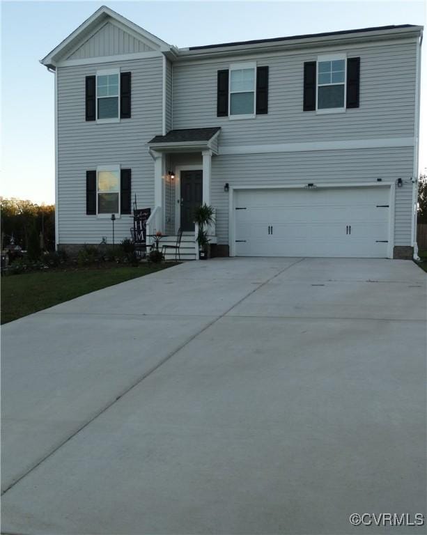 view of front of house with a garage