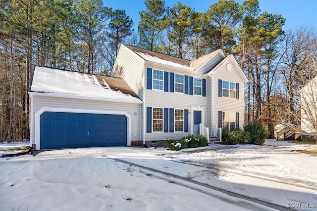 view of front of property with a garage