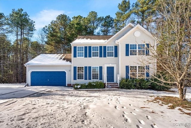 view of front of property featuring a garage