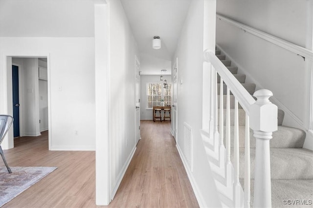 hallway featuring light wood-type flooring