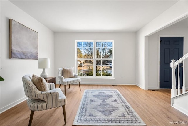 living area with light wood-type flooring