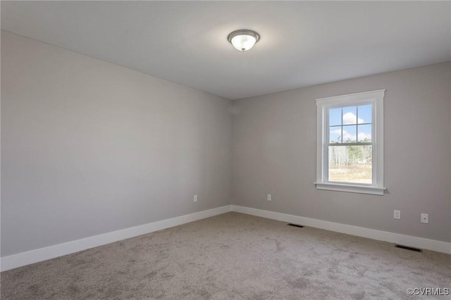 view of carpeted spare room