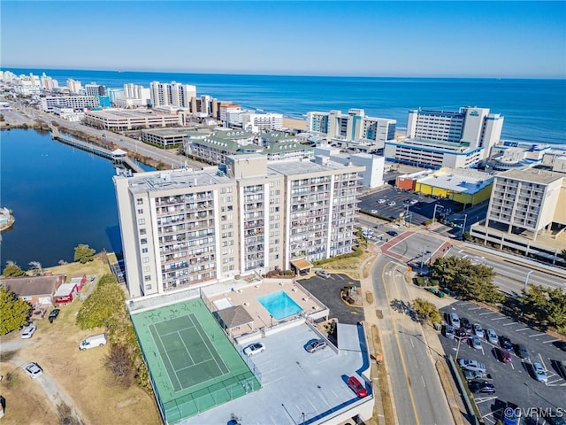 birds eye view of property featuring a water view