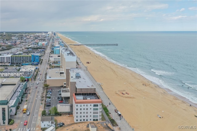 bird's eye view with a water view and a view of the beach