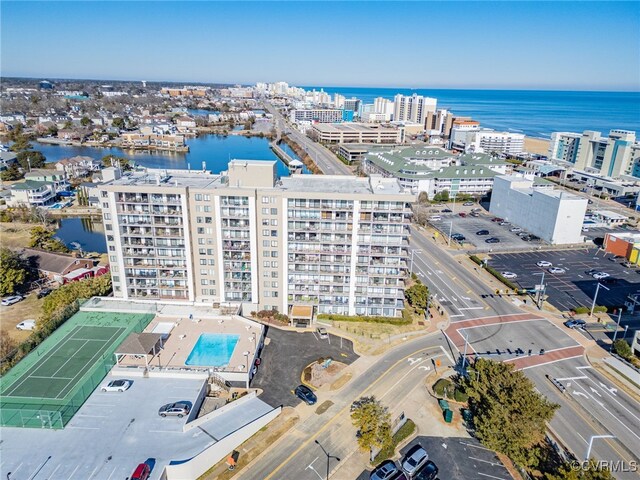 birds eye view of property featuring a water view