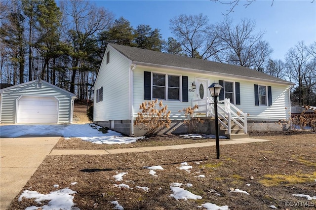 view of front of property with an outbuilding and a garage