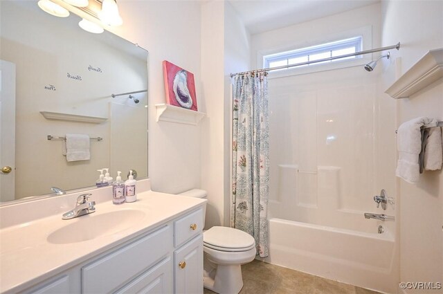 full bathroom featuring toilet, tile patterned floors, shower / bath combo, and vanity