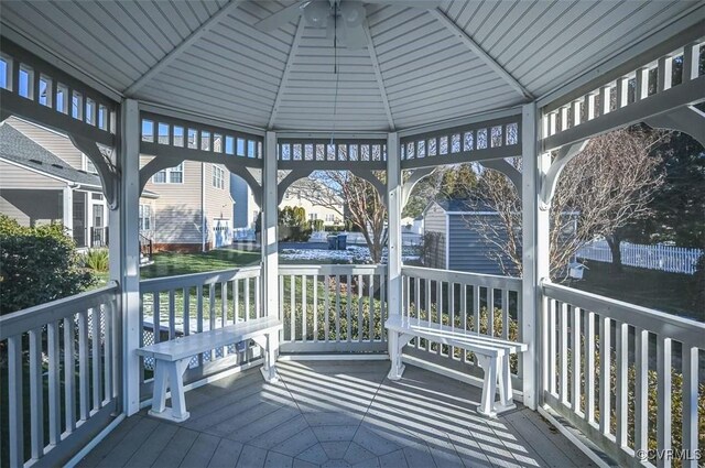 wooden deck featuring a gazebo