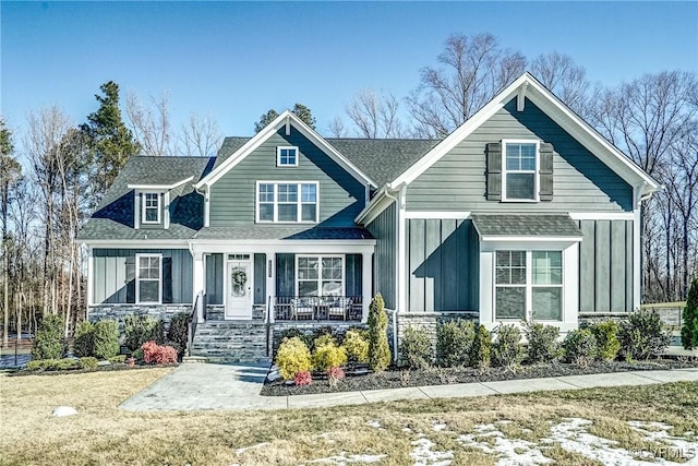 craftsman-style home featuring covered porch