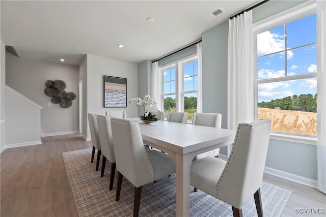 dining room featuring light hardwood / wood-style flooring