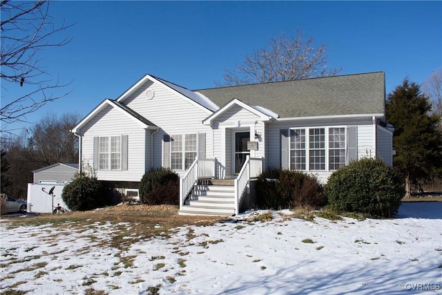 view of front of home with an outbuilding