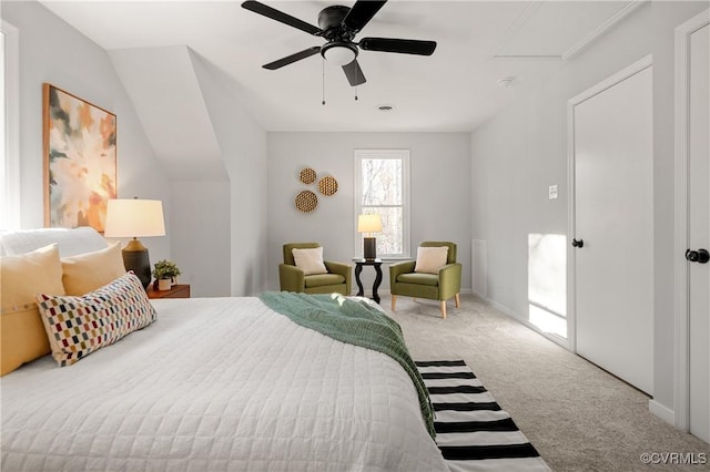 carpeted bedroom with ceiling fan