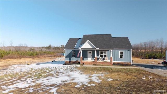 view of front of home featuring covered porch