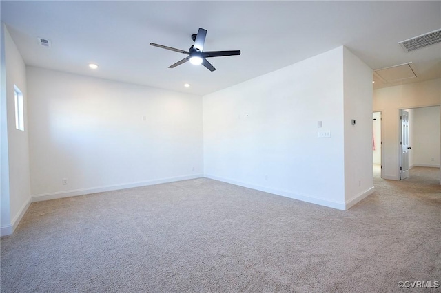 carpeted empty room with ceiling fan