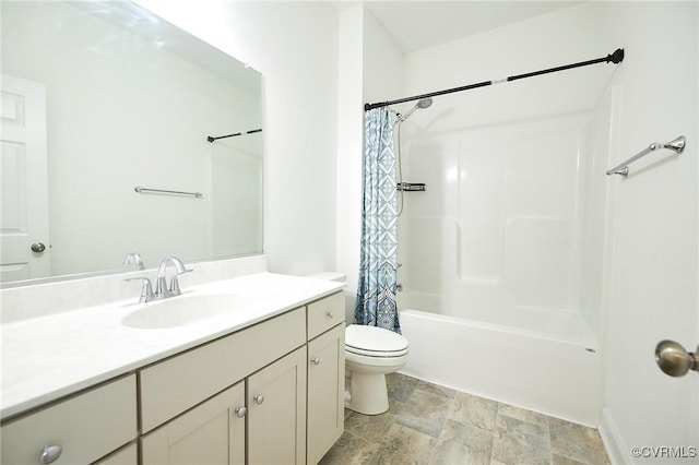 full bathroom featuring shower / bath combination with curtain, vanity, and toilet