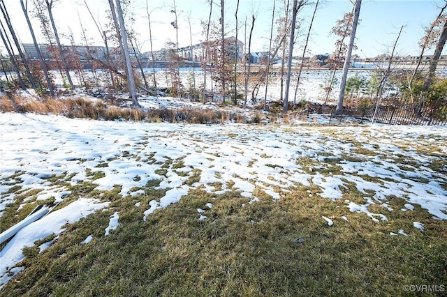 view of yard layered in snow