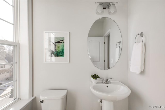 bathroom with sink and toilet