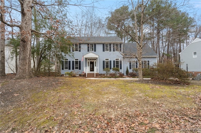 colonial house with a front lawn