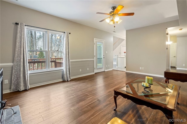 living room with hardwood / wood-style floors and ceiling fan