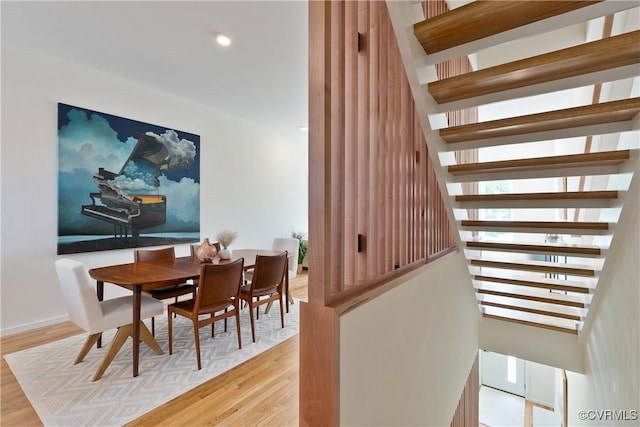 dining room with light hardwood / wood-style floors