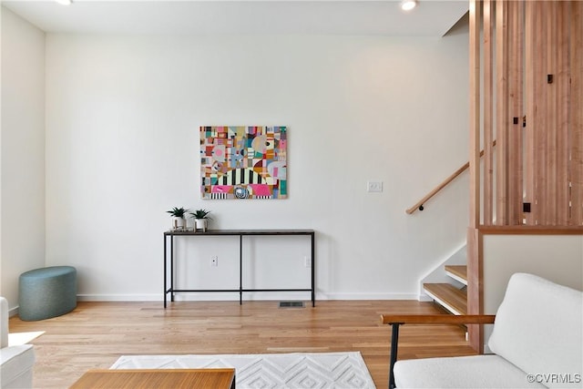 living area featuring hardwood / wood-style flooring