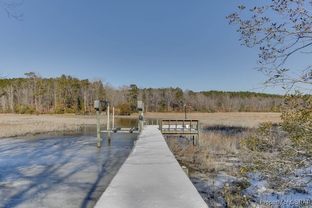 view of dock featuring a water view