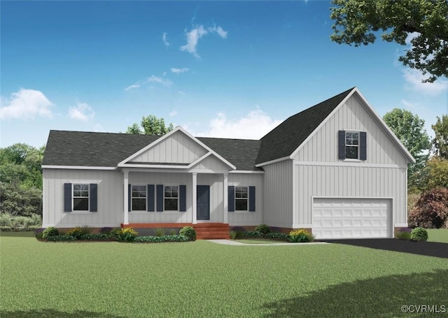 view of front of home featuring a front lawn and a garage