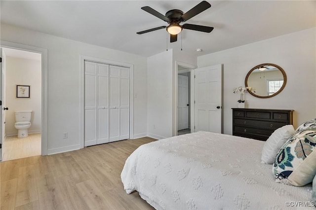 bedroom with connected bathroom, a closet, ceiling fan, and light hardwood / wood-style flooring