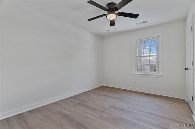 unfurnished room with light wood-type flooring and ceiling fan