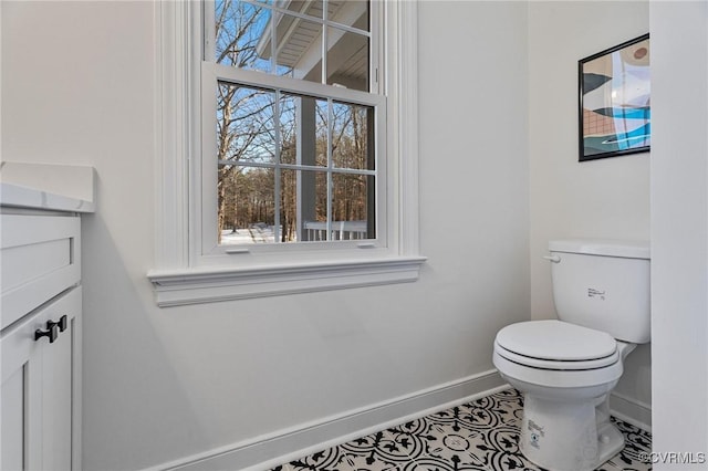 bathroom featuring tile patterned floors and toilet