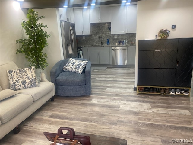 living room with light wood-style floors