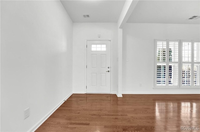 entrance foyer featuring hardwood / wood-style flooring