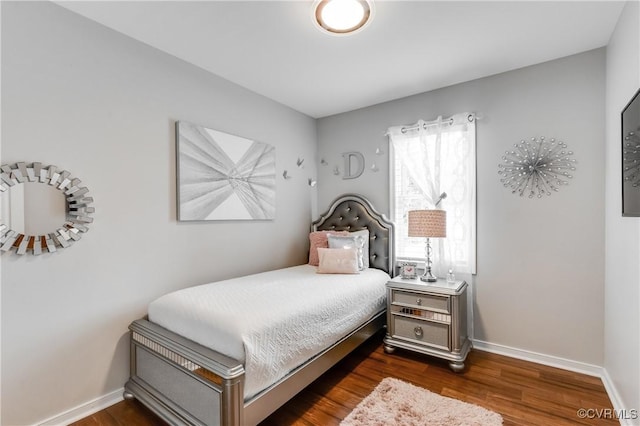 bedroom featuring dark wood-type flooring