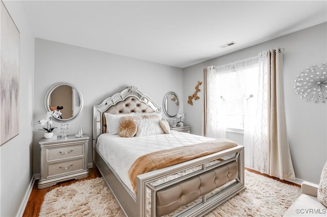 bedroom featuring hardwood / wood-style floors