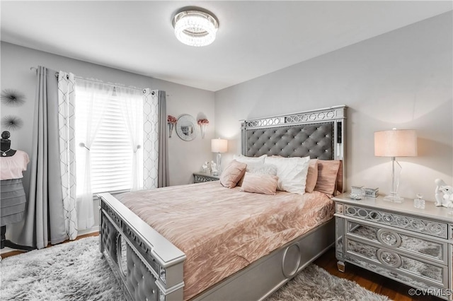 bedroom featuring dark hardwood / wood-style floors