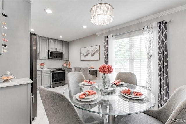 dining room with ornamental molding