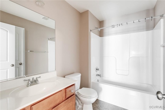 full bathroom featuring shower / bathing tub combination, toilet, and vanity